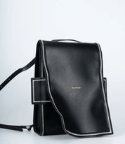 Modern black leather mini backpack – a perfect blend of structure and softness for urban minimalism.