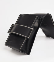 Flexible leather design – soft yet structured convertible backpack with a unique fold-over closure.