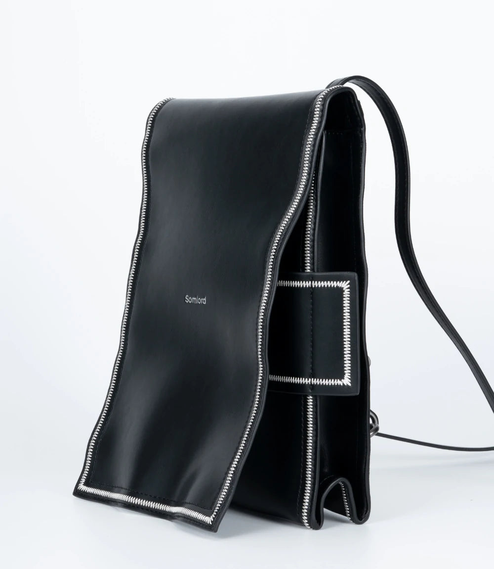 Minimalist and stylish Leather Mini Backpack – featuring high-quality craftsmanship and a refined urban aesthetic.