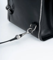 Secure and stylish hardware – durable metal accents on the Convertible Leather Mini Backpack for added luxury.