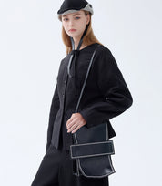 Urban chic Leather Mini Backpack – sleek black design, perfect for modern streetwear and high-fashion looks.