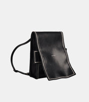 Foldable Leather Mini Backpack – innovative design allowing transformation into a structured handbag or compact backpack.