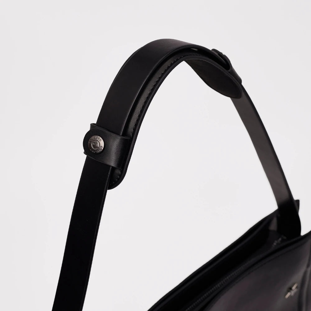 Close-up of the Somlord Anti-Slip Soft Leather Shoulder Pad showcasing premium leather material, ergonomic design, and branded snap button hardware for secure attachment.