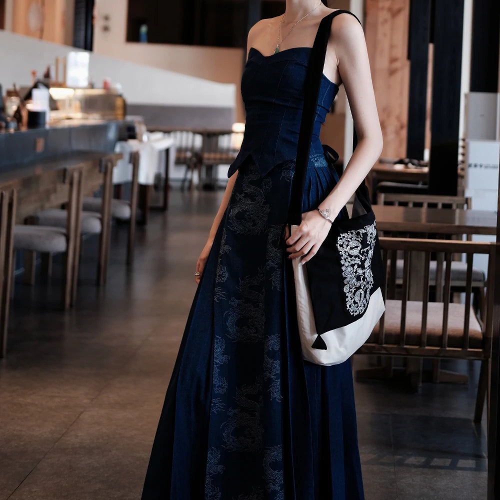 A model effortlessly carries Somlord Artistic Slouchy Embroidered Crossbody Bag in a flowing navy dress, highlighting the bag’s embroidered elegance and urban versatility.