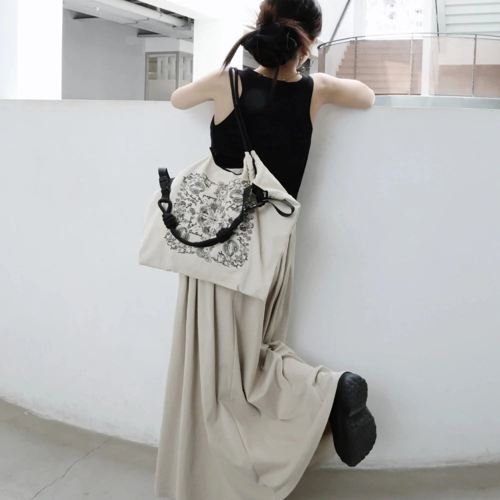 Model wearing Somlord Paisley Embroidered Crossbody Tote Bag, showcasing its versatile style and lightweight structure, perfect for daily casual wear.