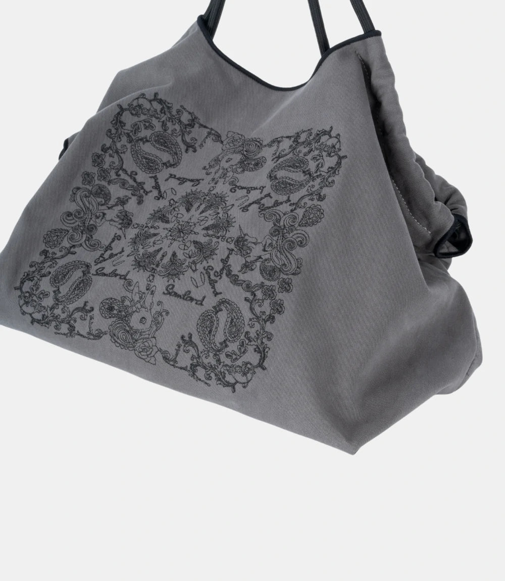 Artistic embroidery details on the Paisley Embroidered Tote – showcasing the structured yet flexible fabric for daily use.