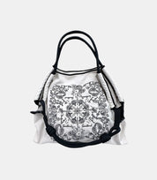 Minimalist White Paisley Embroidered Tote Bag – a versatile crossbody tote with a boho-inspired paisley embroidery pattern.