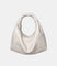Slouchy Leather Cloud Hobo Bag in off-white – soft, minimalist design with a relaxed, crescent shape for effortless chic styling.