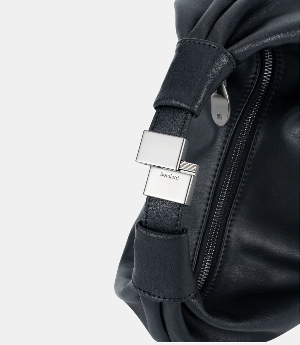 Minimalist styling with the Slouchy Cloud Hobo Bag – a soft leather silhouette complementing neutral and classic outfits.