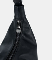 Close-up of reinforced hand-stitched leather handle – ensuring long-lasting wearability of the Cloud Hobo Bag.