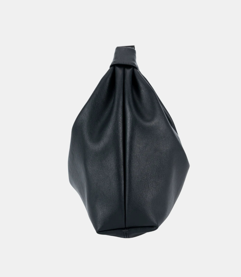 Detailed stitching on leather handle – fine craftsmanship on the Cloud Hobo Bag for durability and a polished finish.