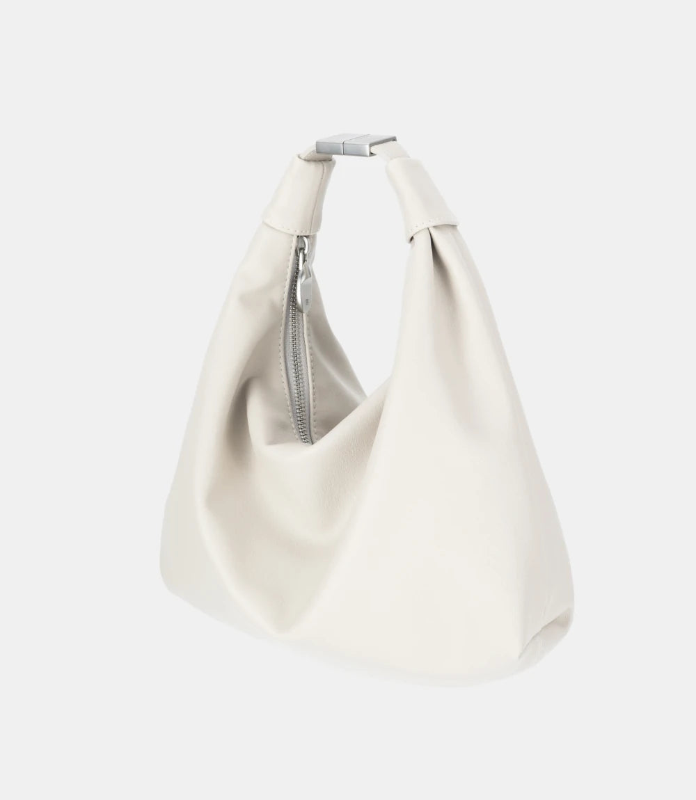 Side profile of the Slouchy Cloud Hobo Bag – unique curved design with a structured base for refined yet effortless wear.