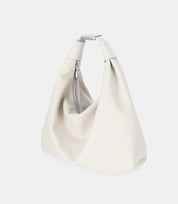 Side profile of the Slouchy Cloud Hobo Bag – unique curved design with a structured base for refined yet effortless wear.