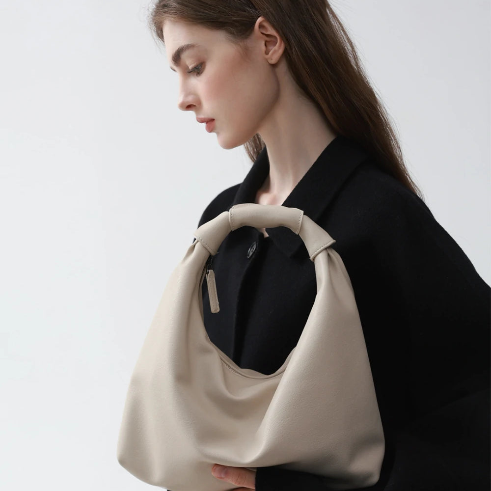 Relaxed luxury – The Slouchy Leather Cloud Hobo Bag offers an effortless, draped silhouette for a laid-back, chic look.