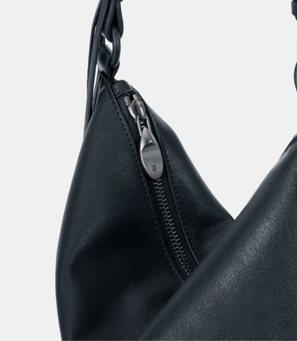 Secure top zipper closure – high-quality metal zip ensuring safety and convenience for daily essentials.