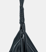 Adjustable shoulder strap detail – high-quality leather with reinforced stitching for durability and comfort.