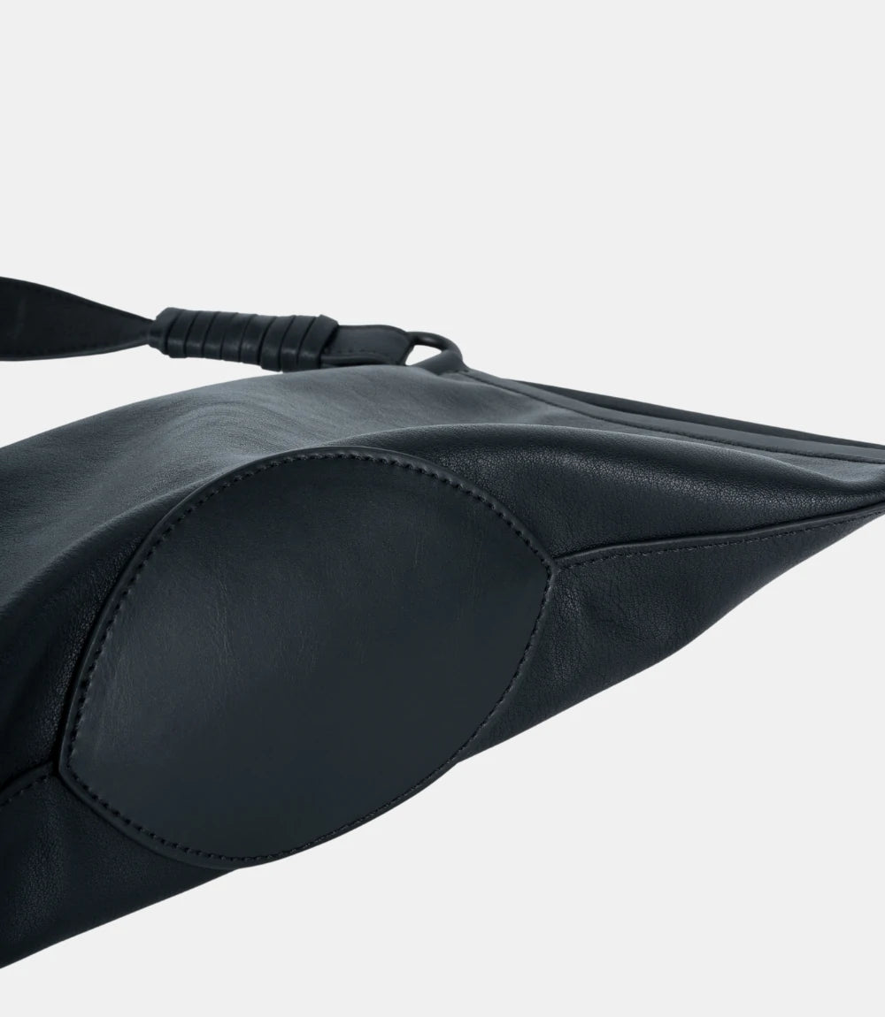 Bottom corner view of the ChicCurve Shoulder Bag – sleek, smooth leather finish with strong craftsmanship.