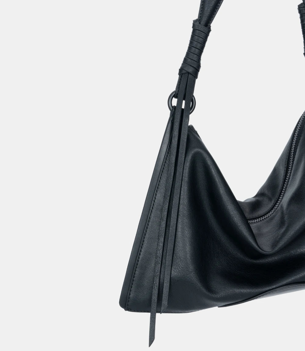 Side profile of the ChicCurve Leather Shoulder Bag – structured yet flexible, designed for stylish urban wear.