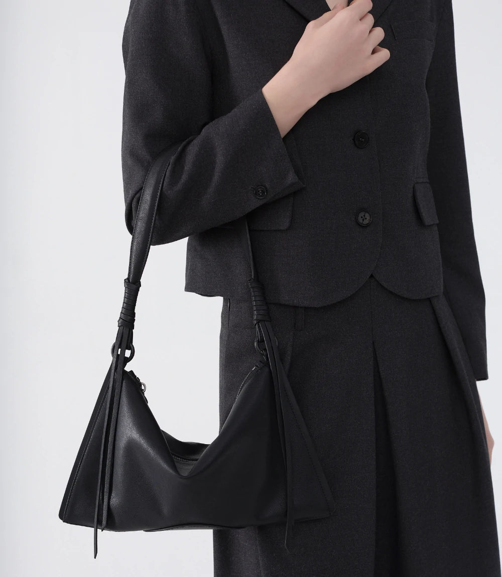 Minimalist black ChicCurve Leather Shoulder Bag – styled effortlessly for an elegant, sophisticated look.