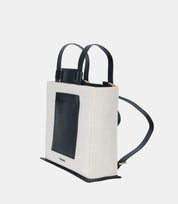 Convertible Canvas Structured Tote Backpack – featuring adjustable straps for both backpack and tote carrying options.