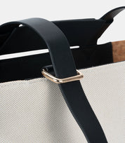 Premium gold-tone metal buckle – adjustable leather shoulder straps for added durability and modern aesthetics.