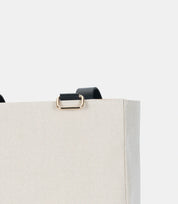 High-quality hardware details – reinforced metal D-rings and canvas material for enhanced durability and a sophisticated finish.